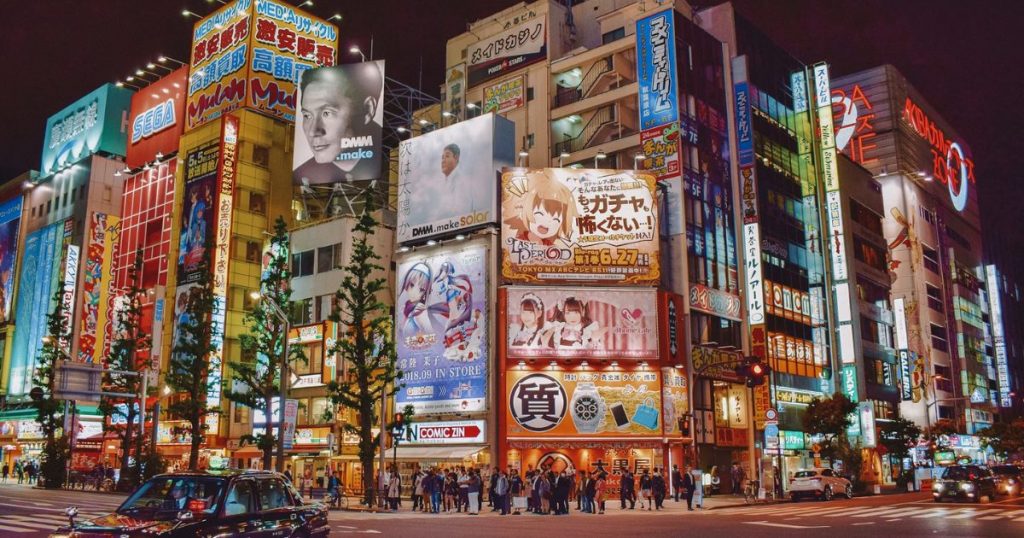 Neon-lit streets of Tokyo’s theatre and entertainment district at night